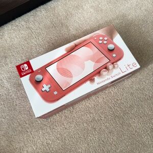 BRAND NEW NINTENDO LITE IN CORAL